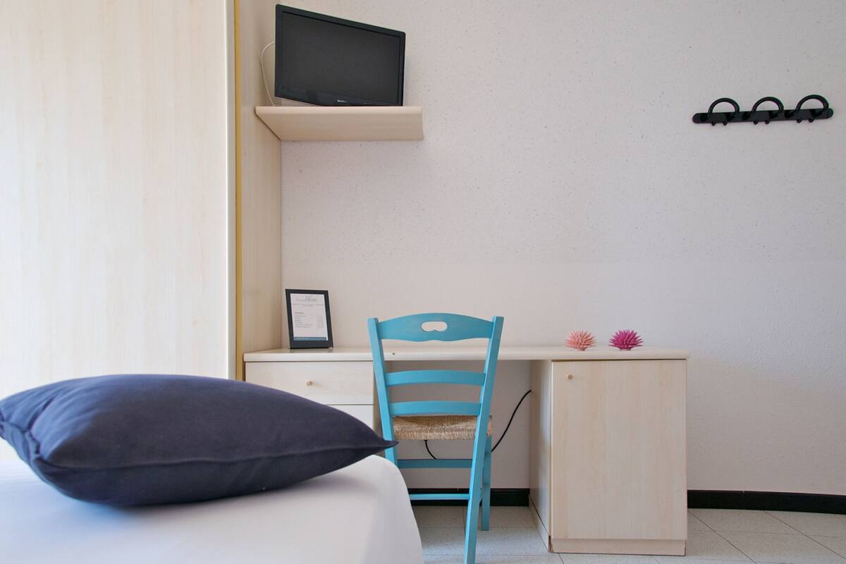 Desk, free WiFi, bed sheets