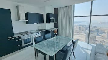 Fridge, oven, cookware/dishes/utensils