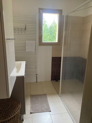 Shower, hair dryer, towels, soap