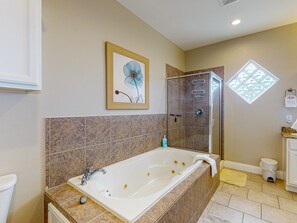 Shower, jetted tub, towels