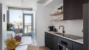 Fridge, microwave, stovetop, coffee/tea maker