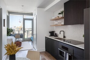 Fridge, microwave, stovetop, coffee/tea maker