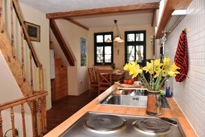 Fridge, oven, coffee/tea maker, toaster