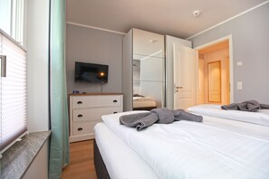 2 slaapkamers, een strijkplank/strijkijzer, gratis wifi, beddengoed