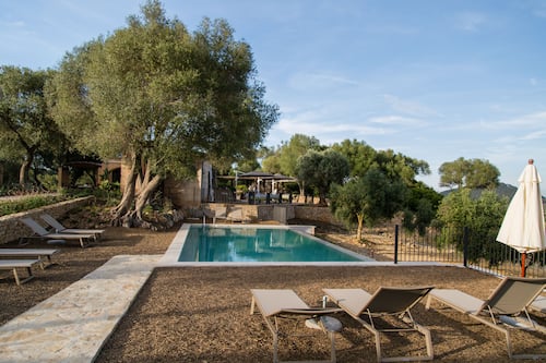 Outdoor pool, open 8:00 AM to midnight, pool umbrellas, sun loungers