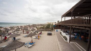 On the beach, beach towels, windsurfing, beach bar