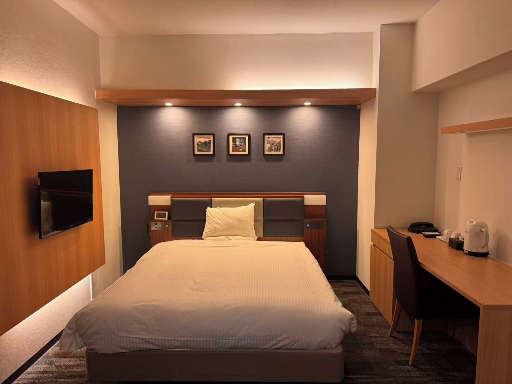 Premium bedding, down duvets, memory-foam beds, in-room safe