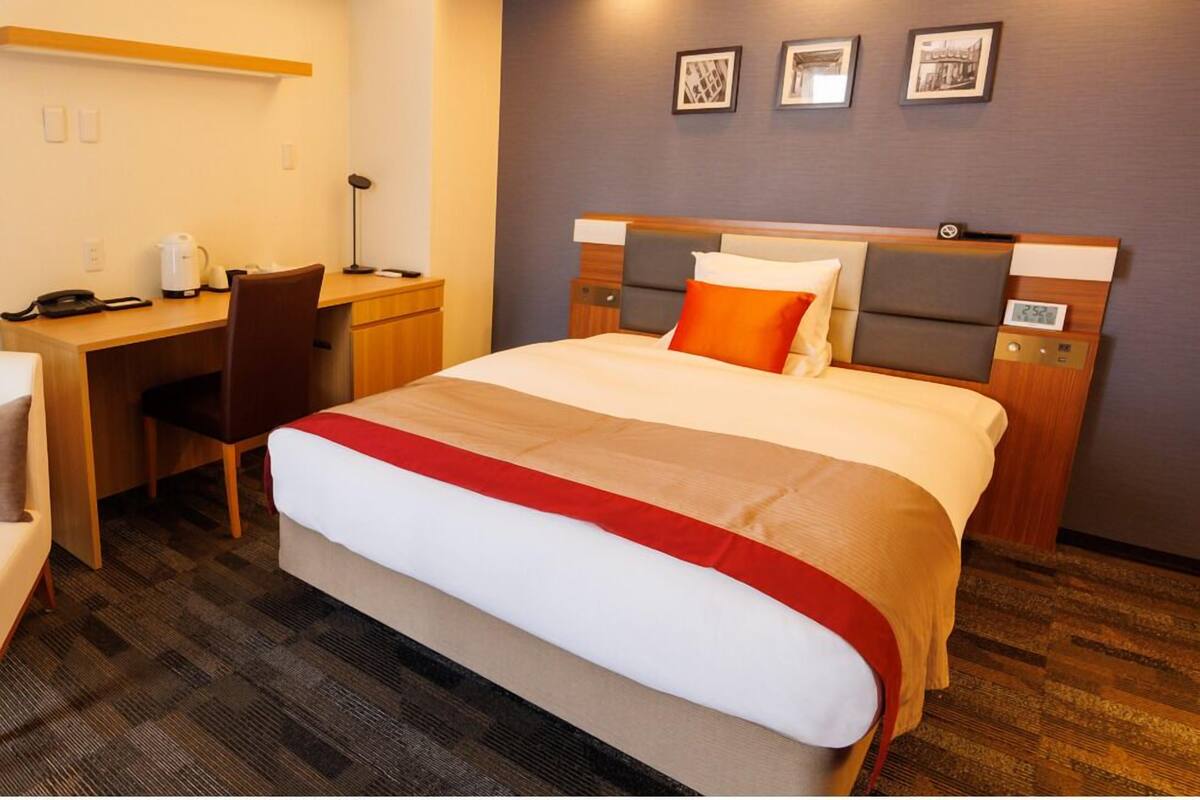 Premium bedding, down comforters, memory foam beds, in-room safe