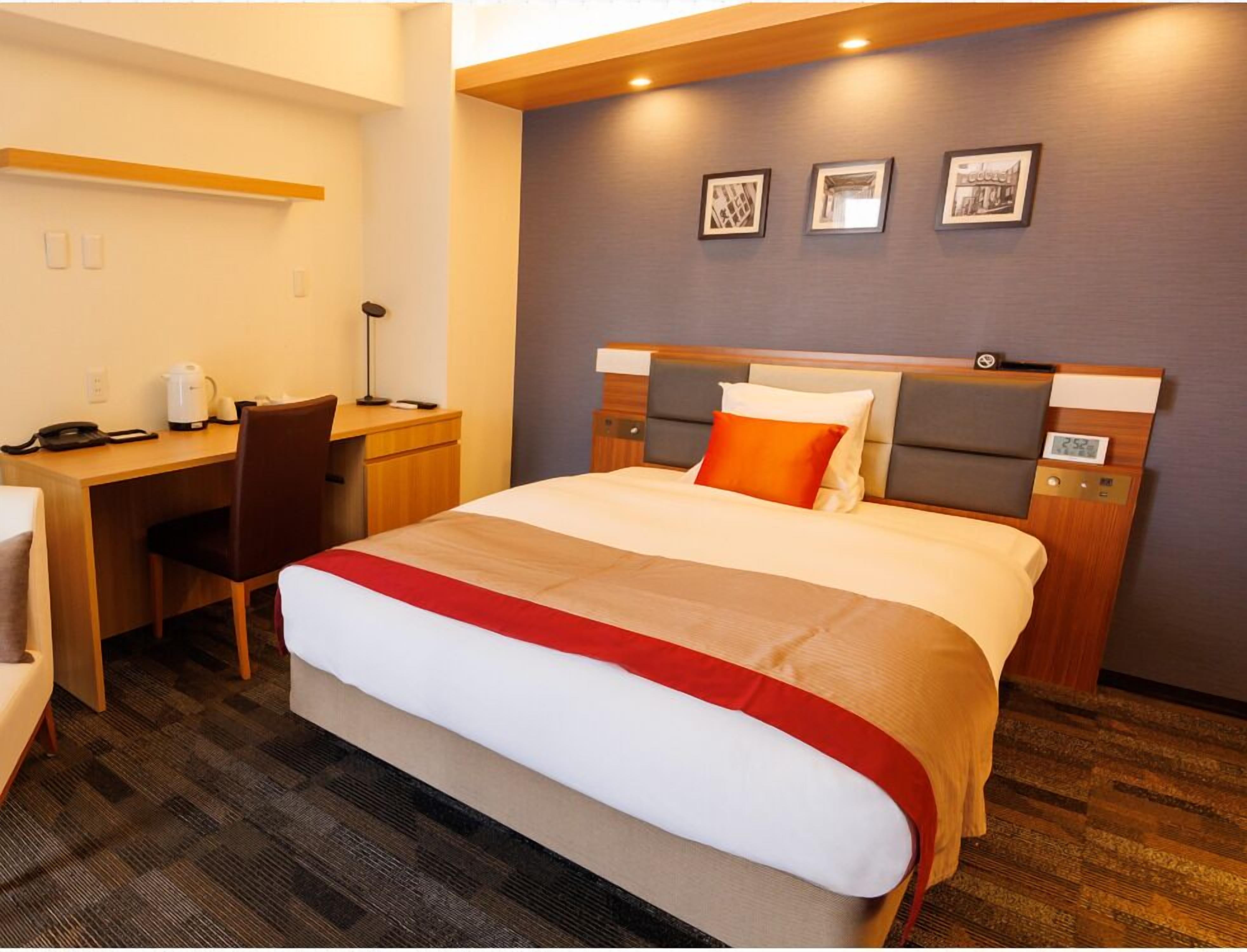 Premium bedding, down duvets, memory-foam beds, in-room safe