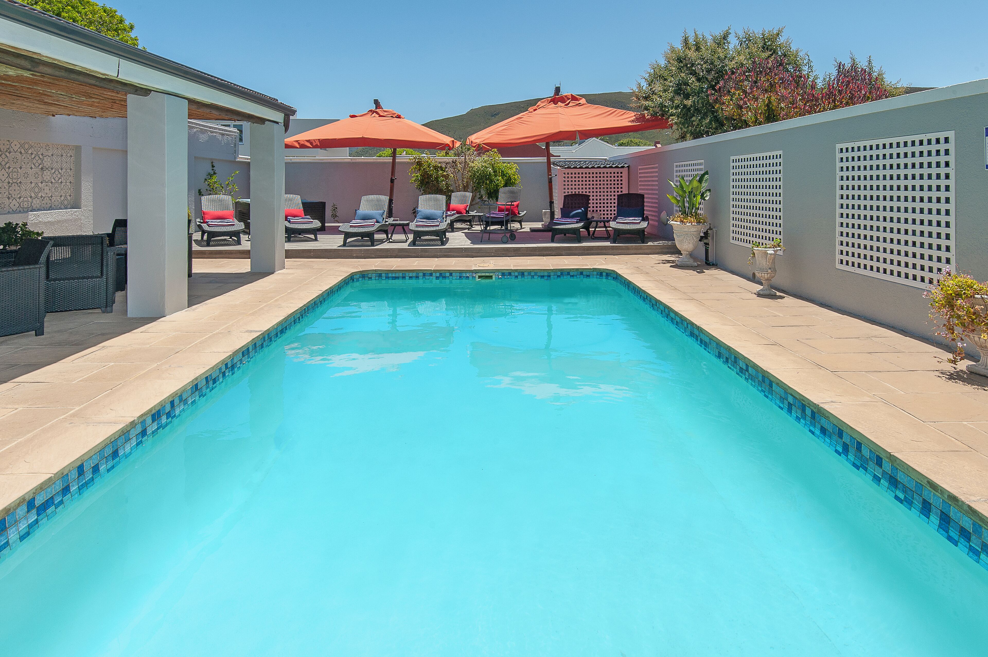 Outdoor pool, pool umbrellas, sun loungers