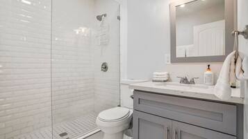Bathtub, hair dryer, towels