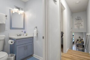 Bathtub, hair dryer, towels