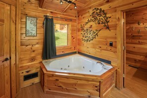 Shower, jetted tub, towels