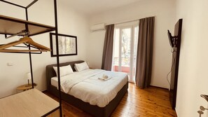 Apartamento, 2 camas Queen | 2 quartos, ferros/tábuas de passar roupa, Wi-Fi de cortesia