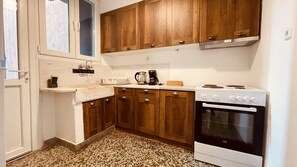 Apartamento, 2 camas Queen | Cozinha privada | Geladeira, fogão, chaleira elétrica, torradeira