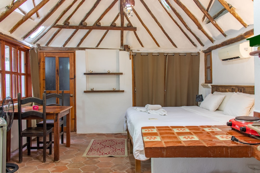 Comfortable cabin in tropical garden setting