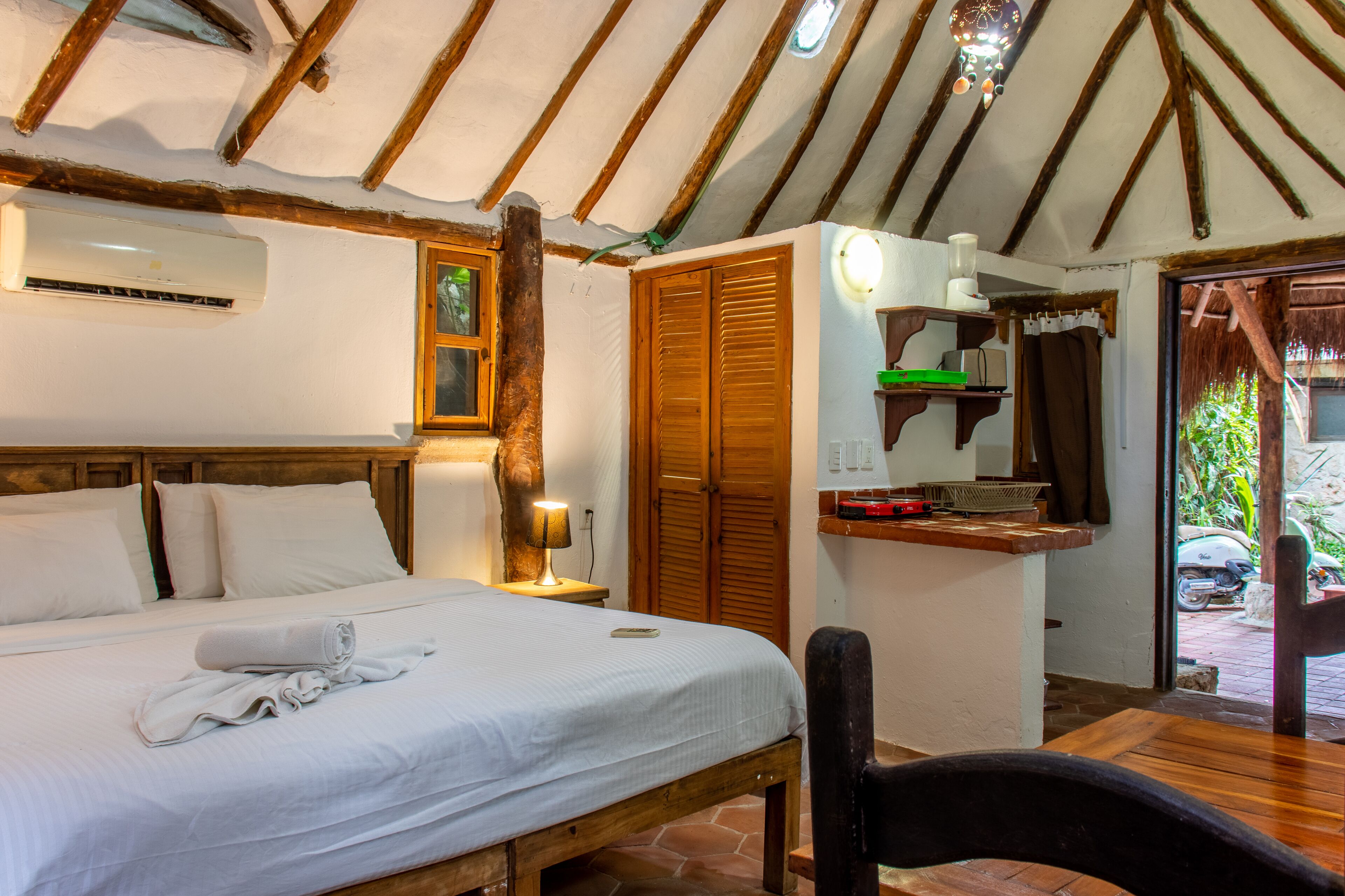 Comfortable cabin in tropical garden setting