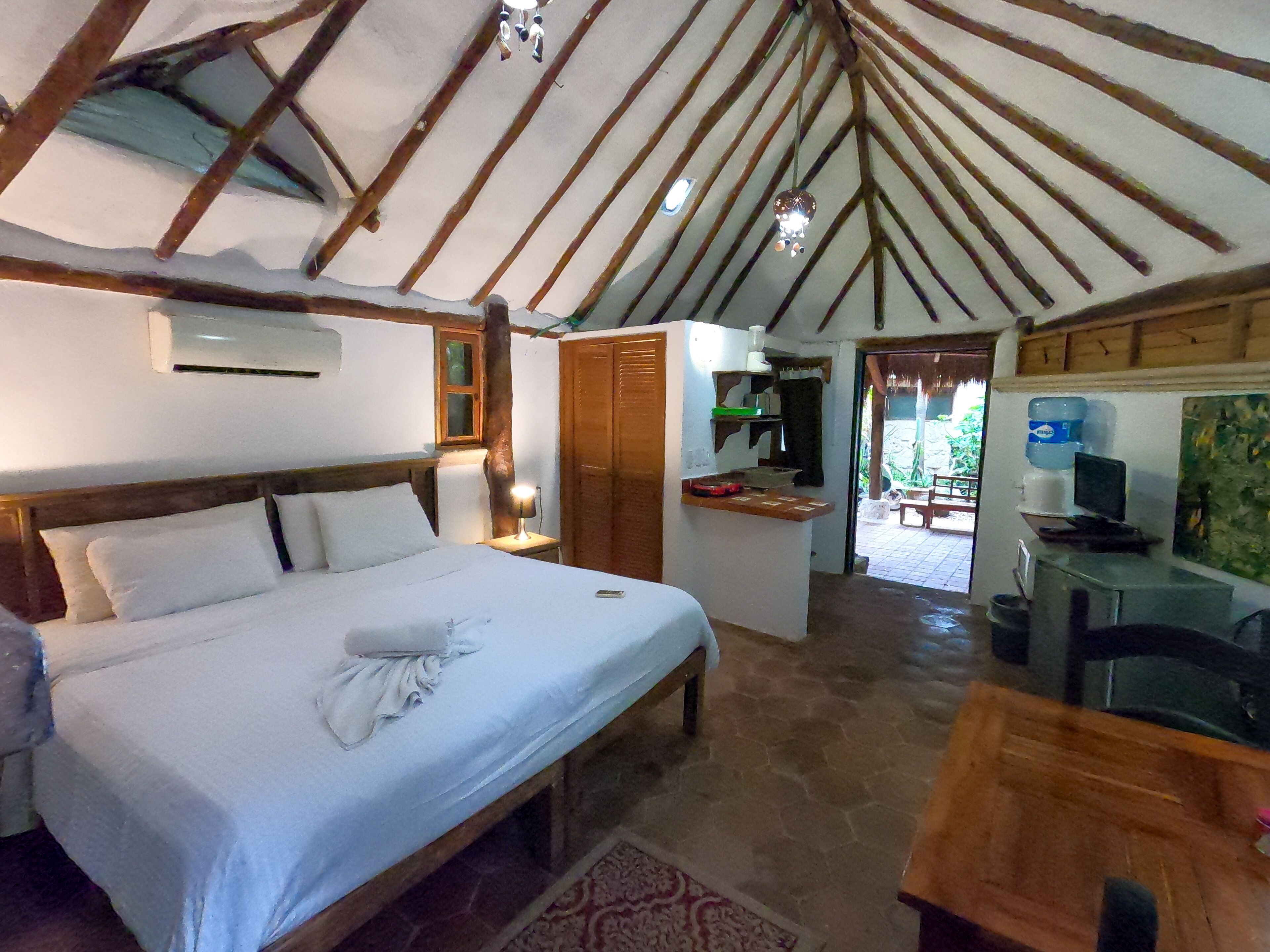 Comfortable cabin in tropical garden setting