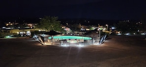 Seasonal outdoor pool, open 7:00 AM to 11:00 PM, pool umbrellas