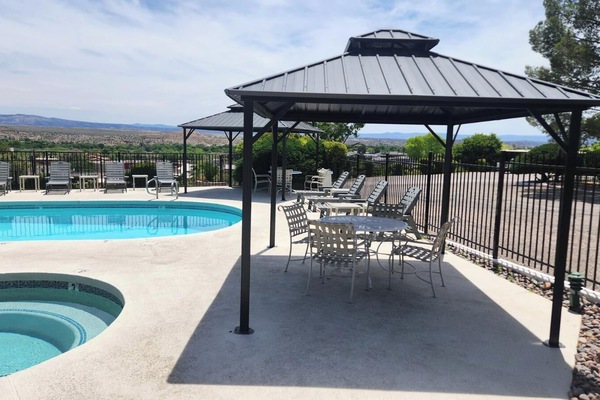 Seasonal outdoor pool, open 7:00 AM to 11:00 PM, pool umbrellas