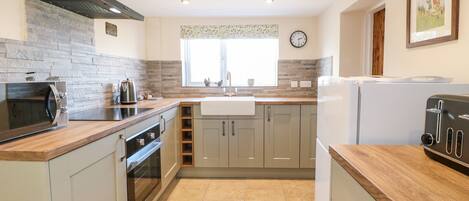 Fridge, electric kettle, toaster, cookware/dishes/utensils