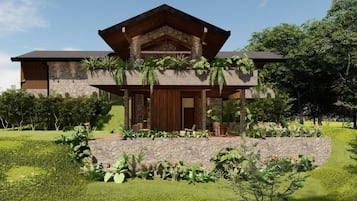 A modern house with a stone facade, wooden accents, and a lush garden.