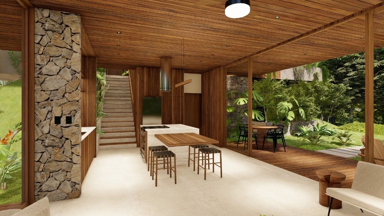 Un interior moderno con techo de madera, pared de piedra, una escalera, un comedor con mesa y sillas, y vista a un jardín exuberante.