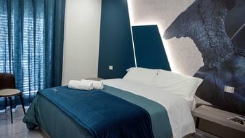 Deluxe kamer, 1 queensize bed, balkon, uitzicht op stad | Luxe beddengoed, Select Comfort-bedden, een minibar, gratis wifi