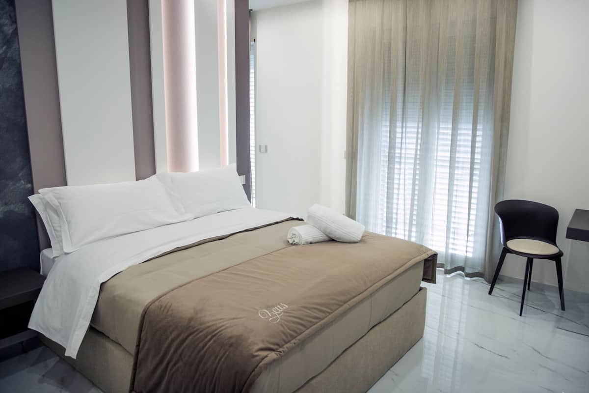 Deluxe Quadruple Room, Balcony, City View | Premium bedding, Select Comfort beds, minibar, free WiFi