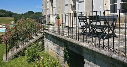 Superb manor house apartment with garden and swimming pool