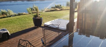 Relax and make magical memories at Our Riverfront Retreat!