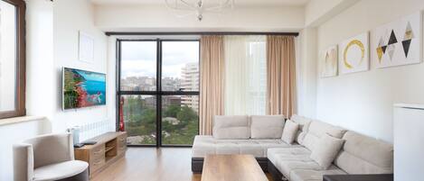 Classic Apartment | Living area | Flat-screen TV