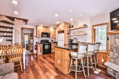 Northwoods home with a playground and boat launch.