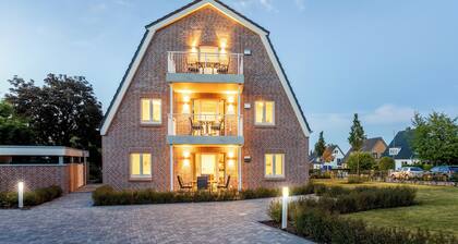 Villa Dornkamp - Stylish living near the beach. Sauna. Terrace. Comfort.