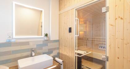 Villa Dornkamp 5 - Retreat under the roof. Sauna. Balcony. Stylish.