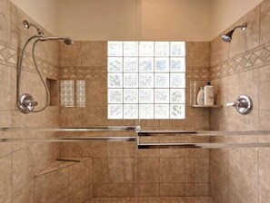 Shower, hair dryer, towels, toilet paper