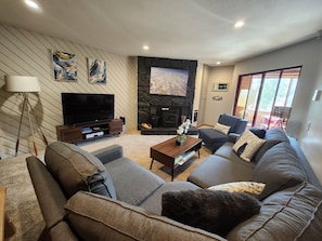Smart TV, fireplace, DVD player, books