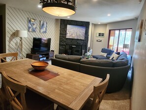 Smart TV, fireplace, DVD player, books