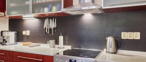 Fridge, dishwasher, cookware/dishes/utensils, dining tables