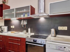 Fridge, dishwasher, cookware/dishes/utensils, dining tables