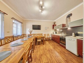 Fridge, dishwasher, cookware/dishes/utensils, dining tables