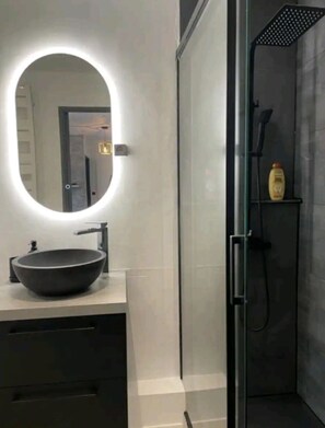 Shower, hair dryer, towels, soap