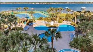 A resort with a large pool, tennis courts, and a view of the sea. - Lagoon Front w/Boat Launch & Parking~2BR/1B (Gulf Shores)