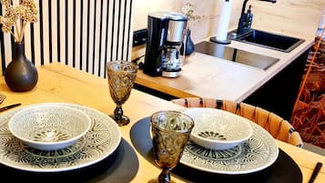 Fridge, microwave, stovetop, coffee/tea maker