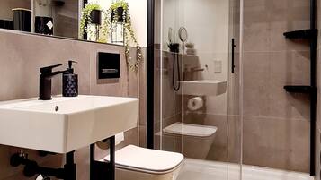 Hair dryer, towels, soap, toilet paper