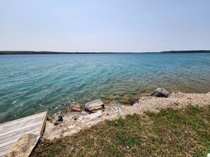 On the beach, sun loungers