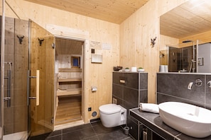 Bathtub, hair dryer, towels