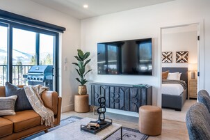 Condo | Living room | 40-inch Smart TV with digital channels, TV