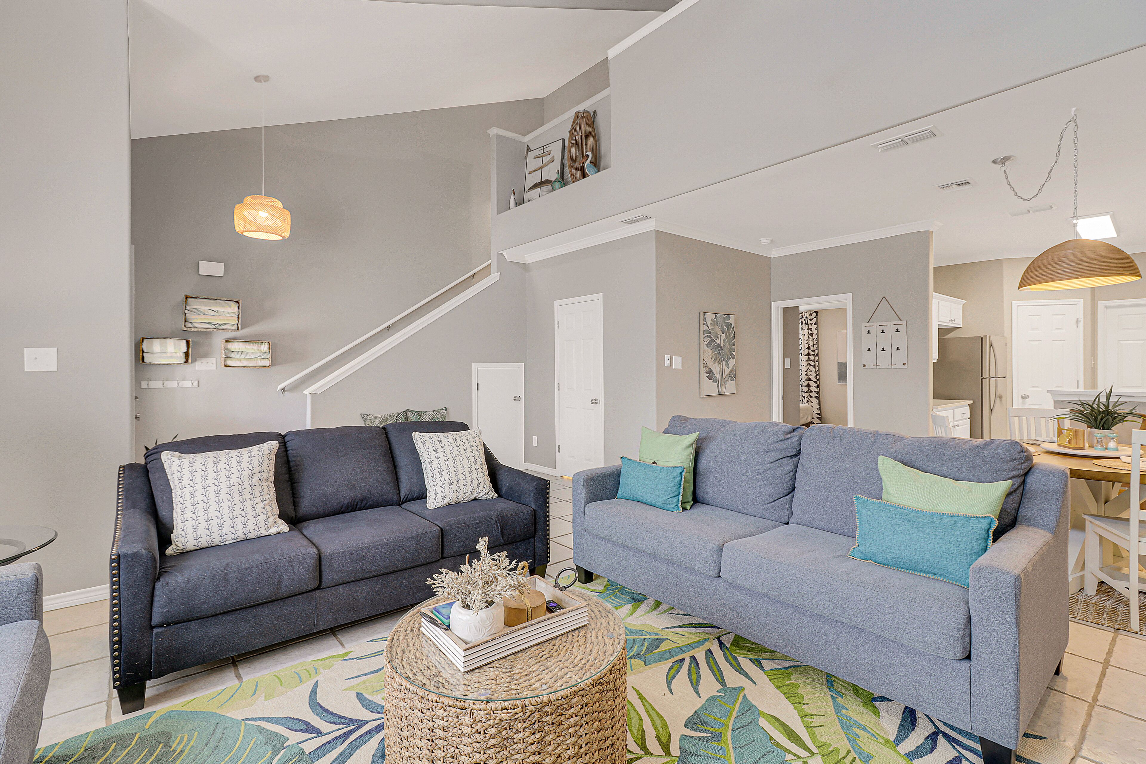 Inviting townhouse with game room, full kitchen, central AC, & W/D