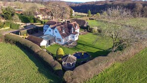 A large house with a well-maintained lawn and a gazebo. - Stunning country house (Bix, outside Henley) (Henley)